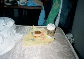 breakfast on a shoestring budget consisted of: a small coffee from Starbucks, and an EggMcMuffin from Macca's.